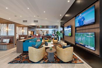 Clubhouse lounges with fireplace & big screens